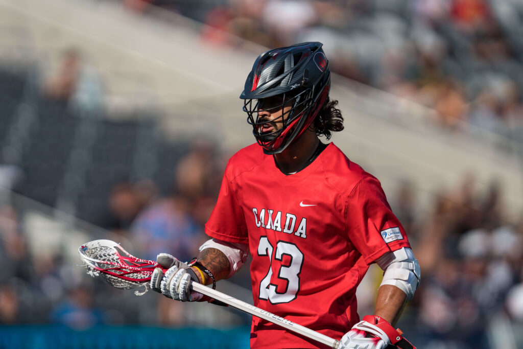 Challen Rogers playing lacrosse