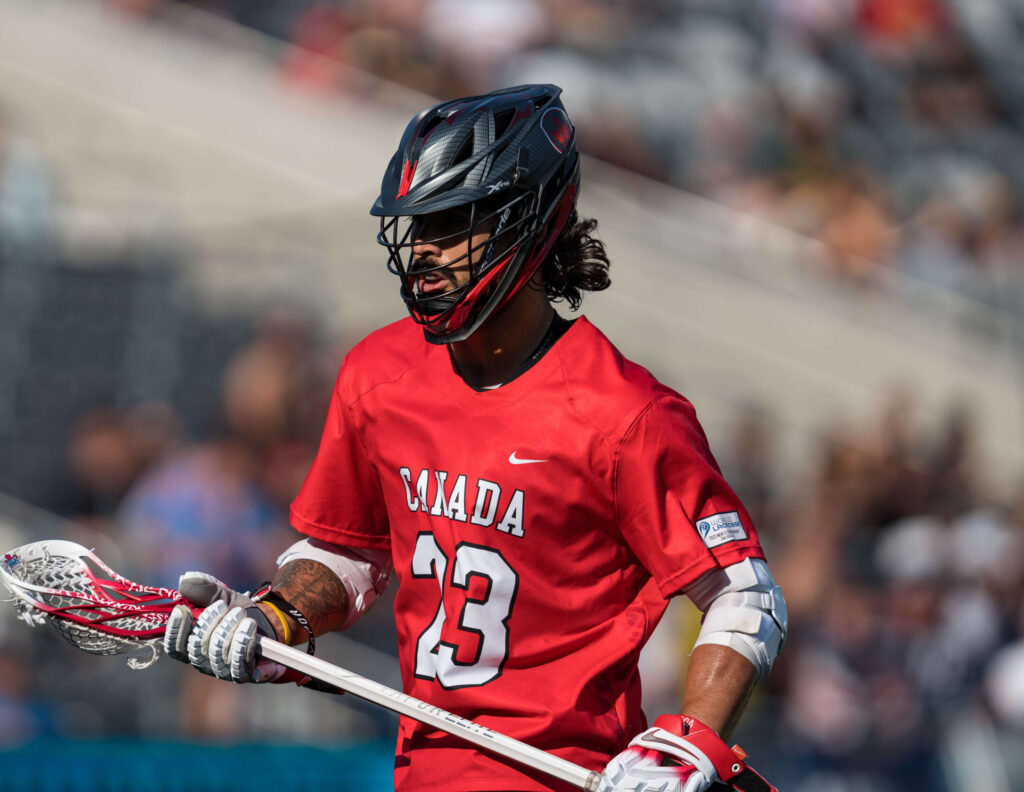 Challen Rogers playing lacrosse